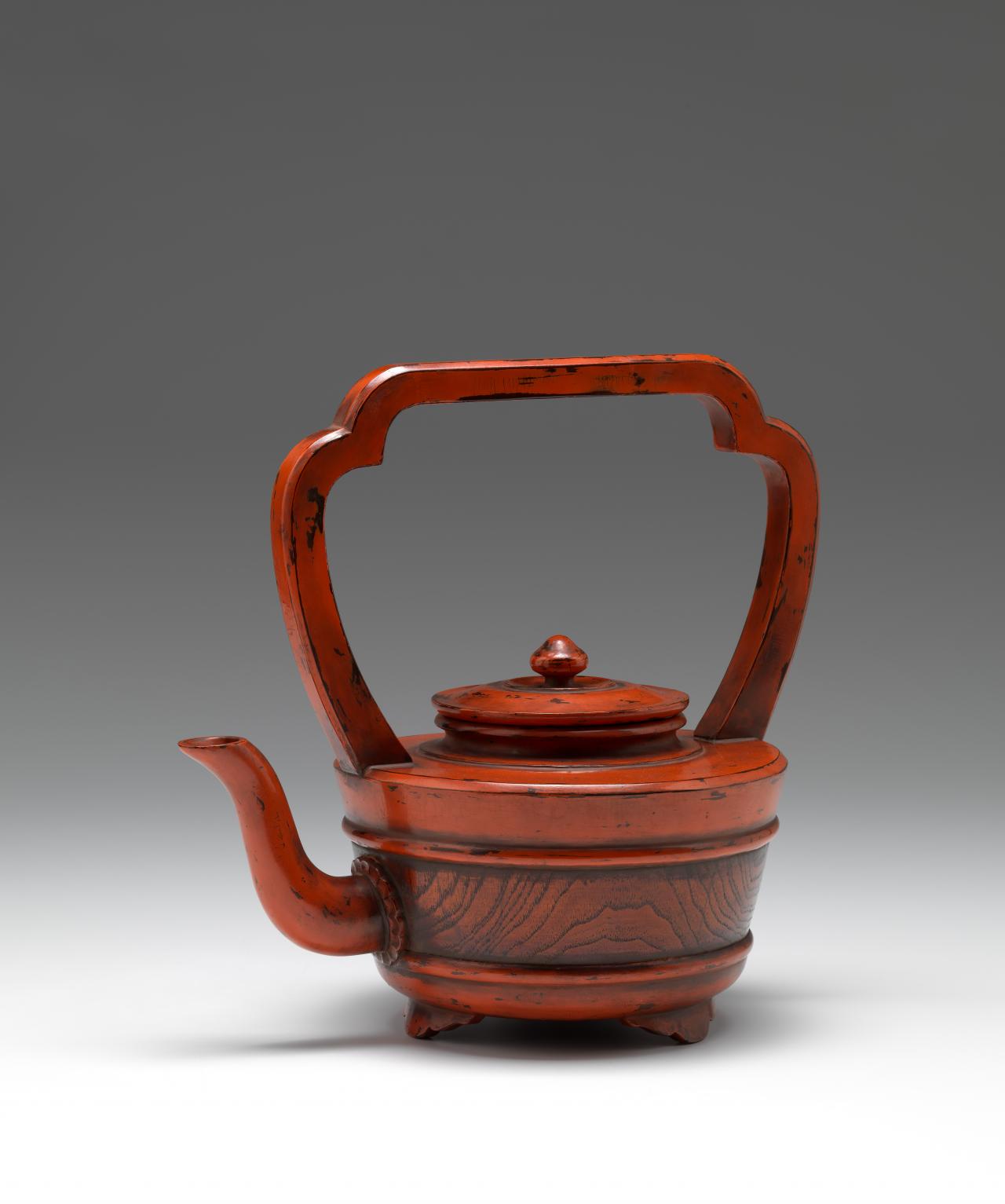 JAPANESE <br/>
<em>Hot water pot</em><br />
<em>Yuto</em> <br />
Muromachi period Momoyama period 16th century, Japan<br />
lacquer on wood (Negoro lacquer)<br />
Gift of Sir Roderick and Lady Carnegie, 1979 (AS8.a-b-1979)<br />