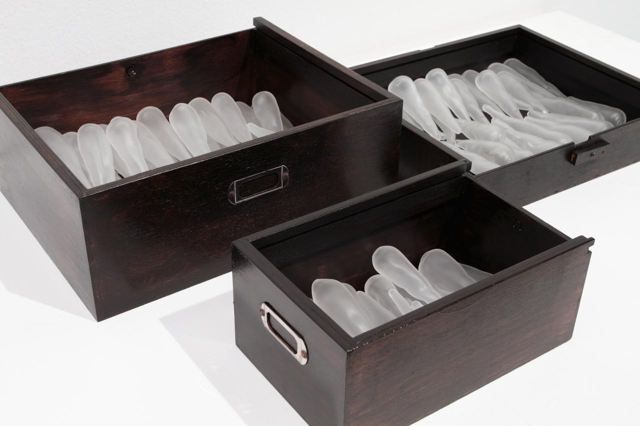 Yhonnie Scarce<br/>
Kokatha/Nukunu born 1973<br />
<em>The collected</em> 2010<br />
glass, wood, transparent synthetic polymer resin<br />
dimensions variable<br />
National Gallery of Victoria, Melbourne<br />
Purchased, NGV Supporters of Indigenous Art, 2011 (2011.355)<br />
© Yhonnie Scarce, courtesy Dianne Tanzer Gallery<br />
Photo: courtesy the artist and dianne tanzer gallery + projects<br />