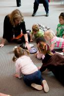 NGV Kids Tot Spot participants seek inspiration from objects in the exhibition Chinoiserie (2009-2010) before decorating their own china plate to keep. 
&copy; National Gallery of Victoria, Melbourne