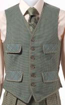 NUTTERS, London (tailor's workshop); Tommy NUTTER (designer)
Suit and tie 1971 (detail)
wool, silk, cotton, acetate (lining), metal
(a) 77.0 cm (centre back)
58.0 cm (sleeve length) (jacket)
(b) 52.0 cm (centre back)
40.4 cm (waist, flat) (vest)
(c) 103.0 cm (outer leg)
37.0 cm (waist, flat) (trousers)
(d) 142.0 x 10.5 cm (tie)
(e) 103.0 cm (outer leg)
37.5 cm (waist, flat) (trousers)

National Gallery of Victoria, Melbourne
Gift of Roger Evans, 1998
1998.6.a-e



