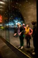 Gallery visitors inspect the waterwall at NGV International during an art after dark event held in conjunction with the 'Salvador Dali: Liquid Desire' exhibition in 2009.
&copy; National Gallery of Victoria, Melbourne