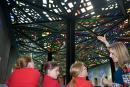 NGV Senior Educator Michele Stockley shows students the Great Hall's stunning stained glass ceiling created by Leonard French.
&copy; National Gallery of Victoria, Melbourne