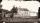 No title (Family outside weatherboard house with slate roof)