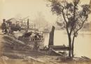 View of the River Murray, near Echuca, showing the Railway Wharf with steamers unloading