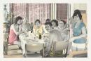 No title (Group of people around a table)