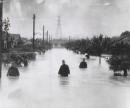 No title (Police wading in floods at Hamilton, December 1934)