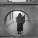 Woman in moon gate