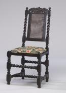 Chair with embroidered cushion