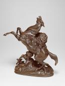 Lion attacking a horse