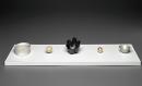 five brooches that are round