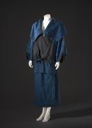 Outfit comprising jacket, skirt and hat