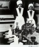 Parlourmaid and Under-parlourmaid ready to serve dinner
