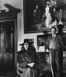 Edith and Osbert Sitwell, beneath family portrait by Sargent, Renshaw Hall, Yorkshire