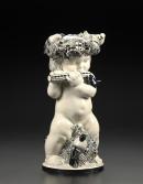 Putto with flute