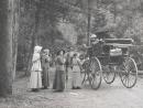 No title (Four women standing by buggy)