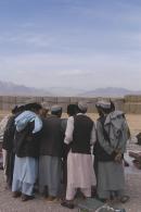 Afghan traders with soldiers, market, Tarin Kowt Base, Uruzgan Province, Afghanistan