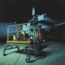 Trolley, propeller change, on flightline at night, military installation, Gulf