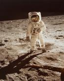 Astronaut Edwin E. Aldrin, Jr., walks on the surface of the moon
