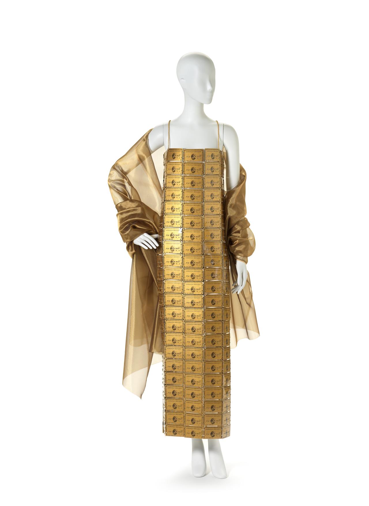 Lizzy GARDINER (designer)<br/>
<em>The American Express ® Gold Card dress</em> (1995-1998) <!-- (front) --><br />

plastic, metal, silk<br />
141.0 cm (centre back) 43.5 cm (waist, flat)<br />
National Gallery of Victoria, Melbourne<br />
Purchased, 1999<br />
1999.56.1<br />
© Lizzy Gardiner and American Express Company®
<!--66073-->