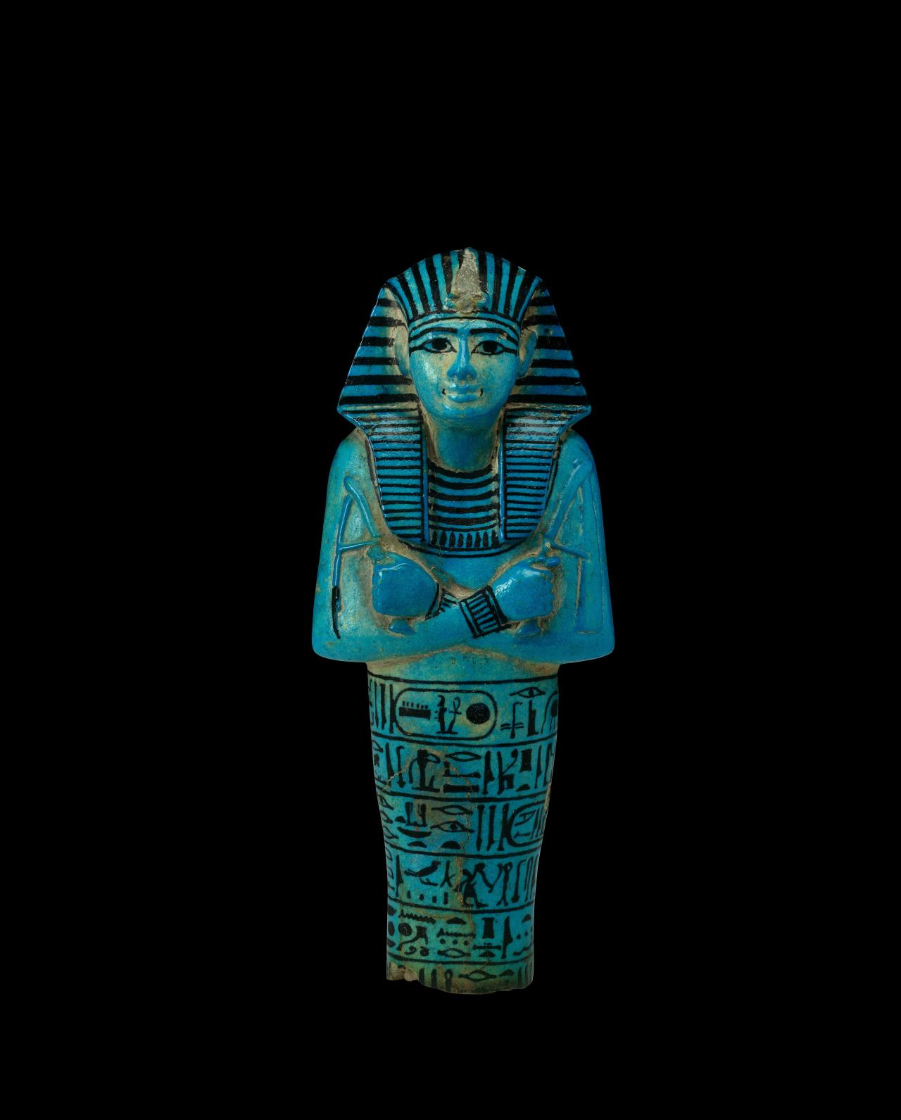 Shabti of Pharaoh Sety I​ <br/>
Tomb of Sety I, Valley of the Kings, Thebes, Egypt​<br/>
19th Dynasty, reign of Sety I, about 1294-1279 BC<br/>
Blue faience ​ <br/>
H 22.8 cm, W 9.6 cm, D 9.6 cm​<br/>
© The Trustees of the British Museum <br/>