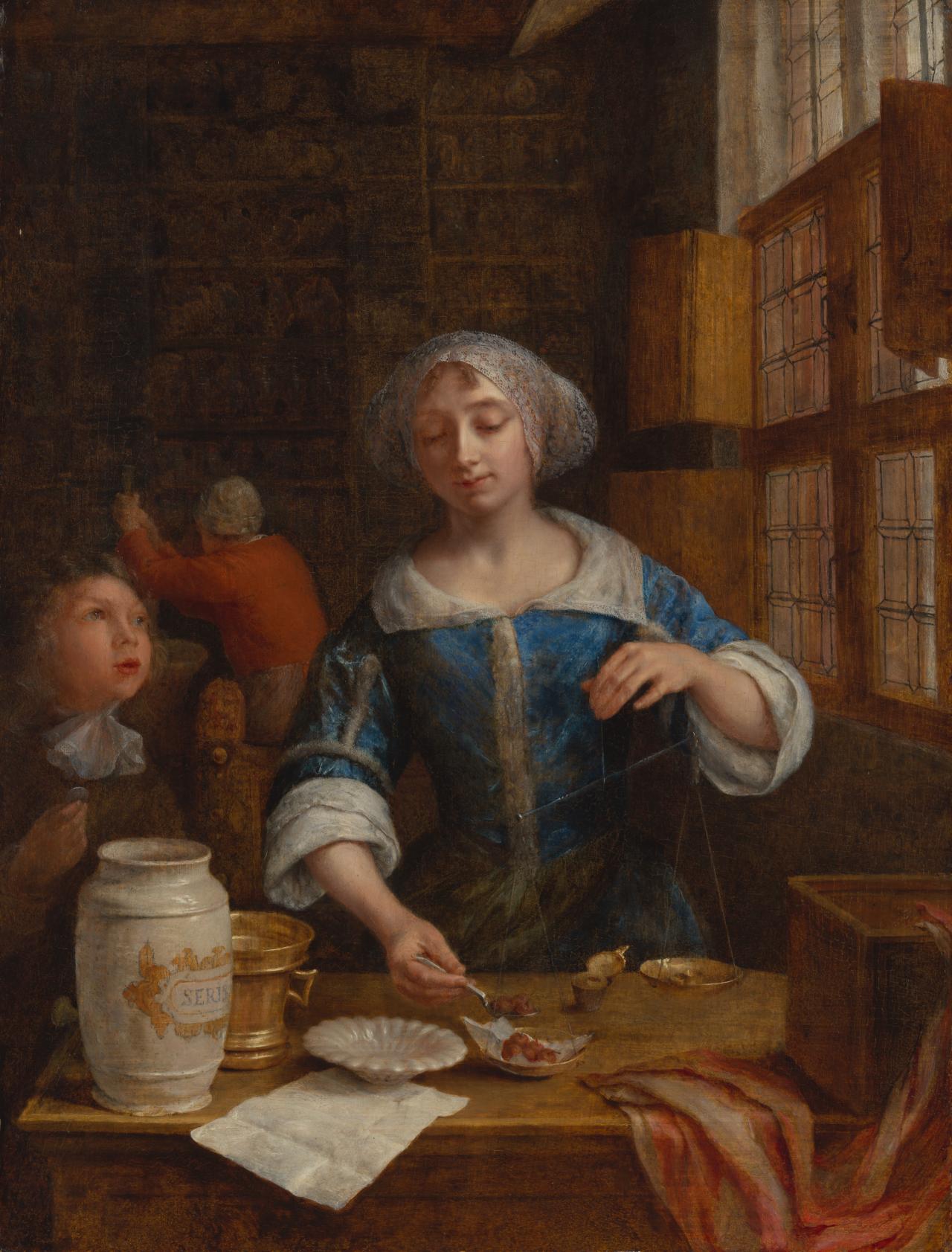 Godfried SCHALCKEN<br/>
<em>A young lady weighing cherries in a shop</em> (c. 1680) <!-- (recto) --><br />

oil on wood panel<br />
36.0 x 27.4 cm<br />
National Gallery of Victoria, Melbourne<br />
Bequest of Robert Victor Jones, 2026<br />
<br />

<!--158174-->