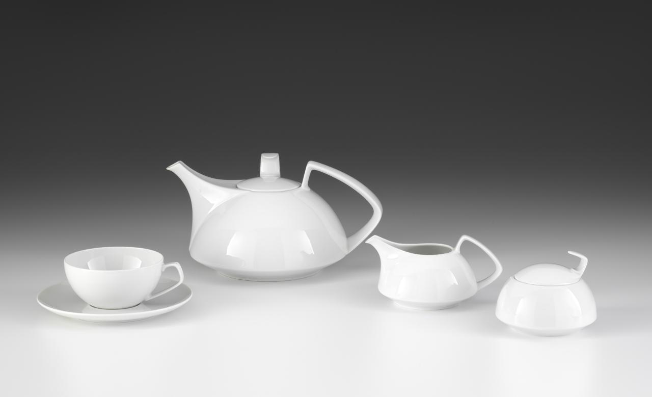ROSENTHAL A. G., Selb (manufacturer)<br />
 Walter GROPIUS (designer)<br />
 Catherine DE SOUZA (designer)<br/>
<em>Gropius white, tea service</em> (1969) {designed} <!-- (view 1) --><br />

porcelain (hard paste)<br />
(a-c) 12.5 x 23.9 x 17.7 cm (overall) (teapot) (d) 7.2 x 14.2 x 10.2 cm (creamer) (e-f) 7.9 x 10.0 cm diameter (overall) (lidded sugar box) (g-h) 5.6 x 15.8 cm diameter (overall) (cup and saucer)<br />
National Gallery of Victoria, Melbourne<br />
Gift of John Hinds, 2022<br />
2022.983.a-h<br />

<!--144200-->