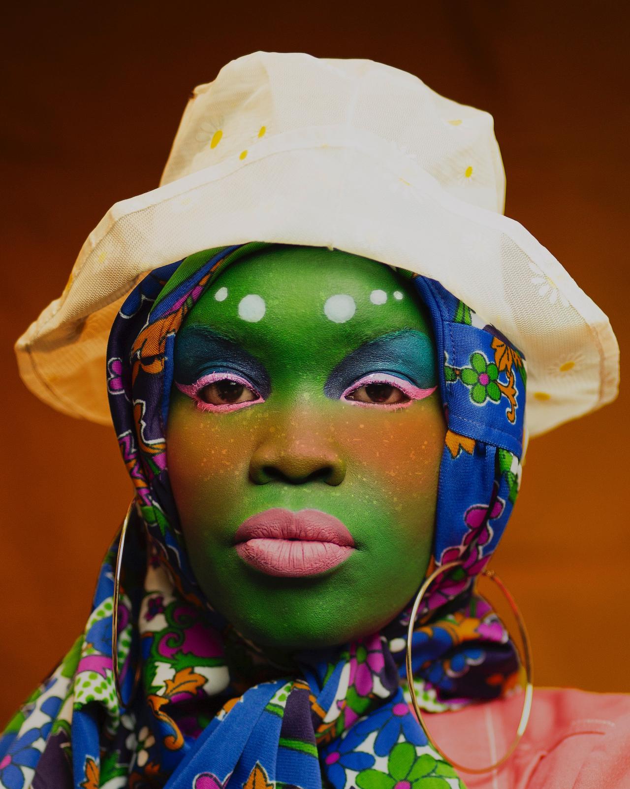 Atong ATEM<br/>
<em>Red dust sticks to you</em> (2022) <!-- () --><br />

inkjet print<br />
(148.2 x 118.2 cm) (image and sheet)<br />
National Gallery of Victoria, Melbourne<br />
Purchased, Victoria Foundation for Living Australian Artists, 2022<br />
2022.1562<br />
&copy; Atong Atem
<!--149749-->