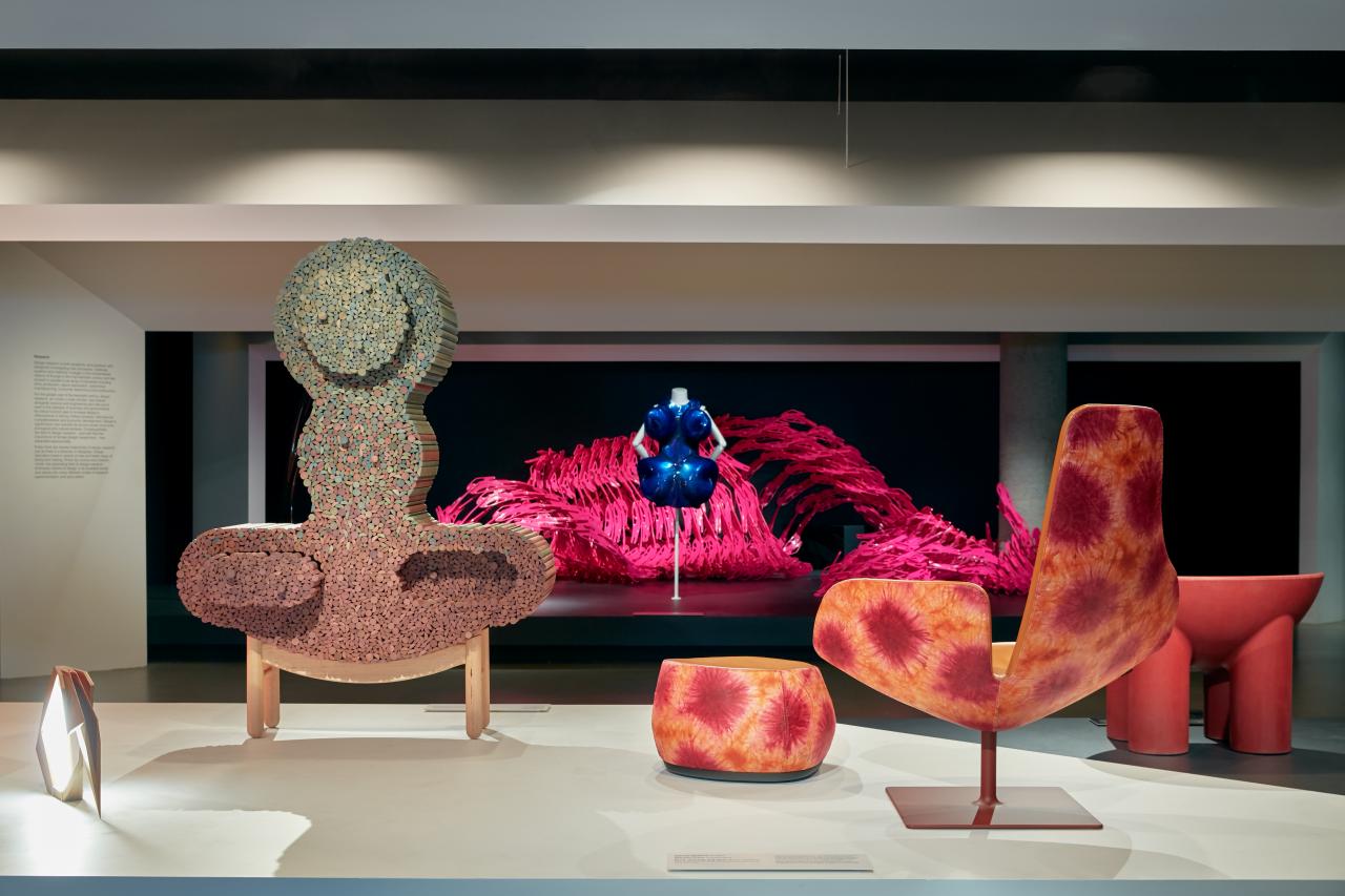 Installation view of <em>Designing Women</em> at NGV International, 28 Sep 2018 – 24 Mar 2019<br/>
(from left to right)<br/>
Aljoud Lootah (designer) <br/>
United Arab Emirates born 1983 <br/>
<em>Oru lamp</em> 2015 <br/>
teak (sp. Tectona grandis), copper, opaque synthetic polymer resin, electrical cord ed. 1/5 <br/>
Purchased with funds donated by Mrs Krystyna Campbell-Pretty, 2016<br/>
Elliat Rich (designer) <br/>
France born 1979, arrived Australia 1980 <br/>
Luke Mills (maker) <br/>
New Zealand born 1987 <br/>
<em>Standing place</em> from the <em>Other Places</em> series 2018 <br/>
Tasmanian oak ed. 1/8 <br/>
Purchased with funds donated by Jo Hogan<br/>
Alisa Andrasek (designer) <br/>
Croatia born <br/>
Jose Sanchez (designer) <br/>
Chile born c. 1980 <br/>
Bloom Games, London (studio) <br/>
England est. 2012 <br/>
<em>Bloom</em> 2012 <br/>
plastic <br/>
Presented by RMIT University, 2018<br/>
Iris van Herpen, Amsterdam (fashion house) <br/>
The Netherlands est. 2007 <br/>
Iris van Herpen (designer) <br/>
The Netherlands born 1984 <br/>
<em>Dress</em> 2011 <br/>
acrylic, nylon (tulle), metal <br/>
Purchased with funds donated by Norma and Stuart Leslie, 2016<br/>
Patricia Urquiola (designer) <br/>
Spain born 1961 <br/>
Moroso, Udine (manufacturer) <br/>
Italy est. 1952 <br/>
<em>Fjord, armchair and Fjord stone, footstool</em> 2002 designed, 2016 manufactured <br/>
painted stainless steel, aluminium, polyurethane foam, leather, waxed silk, plastic <br/>
Purchased with funds donated by Gordon Moffatt AM, 2016<br/>
Faye Toogood (designer) <br/>
England born 1977 <br/>
Studio Toogood Ltd, London (design studio and manufacturer) <br/>
England est. 2008 <br/>
<em>Roly poly armchair</em> 2014 designed, 2017 manufactured <br/>
fibreglass <br/>
Purchased with funds donated by Krystyna Campbell-Pretty, 2018<br/>
Photo: Tom Ross<br/>