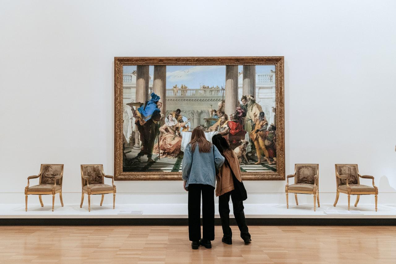 Visitors viewing Giovanni Battista Tiepolo's <em>The Banquet of Cleopatra</em> 1744 at NGV International. Photo: Liz Sunshine<br/>