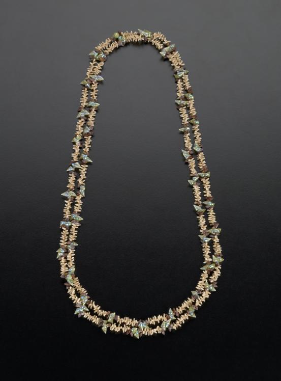 Dulcie Greeno<br/>
<em>Necklace</em> 2001 <!-- (full view) --><br />

maireeners (Phasianotrochus irisodontes), rice shells (Truncatella scalarina), oat shells (Mitrella lincolnensis), cotton thread<br />
41.6 x 14.0 x 1.5 cm<br />
National Gallery of Victoria, Melbourne<br />
Purchased with funds donated by Supporters and Patrons of Aboriginal Art, 2003<br />
2003.444<br />
© Dulcie Greeno
<!--73245--><br/><a class="col-link block" href="/explore/collection/work/73245"><strong>Collection page <i class="fa fa-angle-right"></i></strong></a>