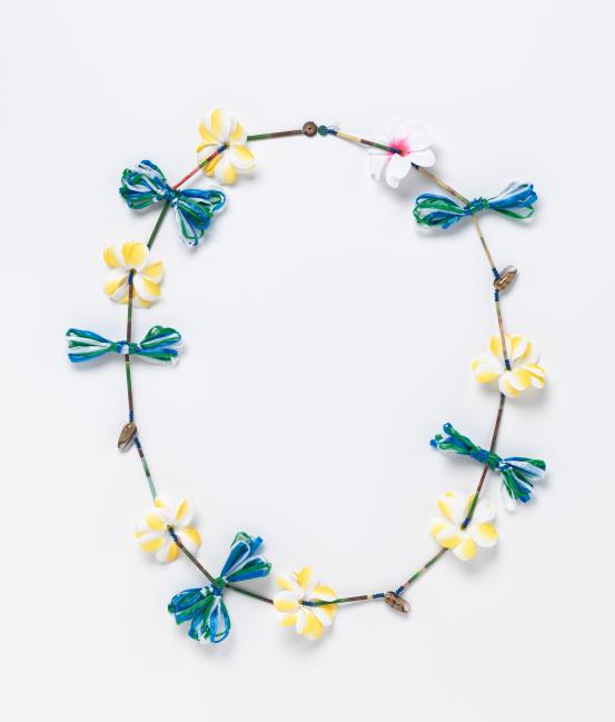 Cessa Nakata<br/>
<em>Frangipani land</em> 2017 <!-- (front view) --><br />

shells, painted bamboo, plastic, polyester raffia, wood, coconut shell, synthetic thread<br />
68.0 x 29.0 x 4.5 cm (variable)<br />
National Gallery of Victoria, Melbourne<br />
Purchased, Victorian Foundation for Living Australian Artists, 2018<br />
2018.13<br />
&copy; Cessa Nakata
<!--127423-->