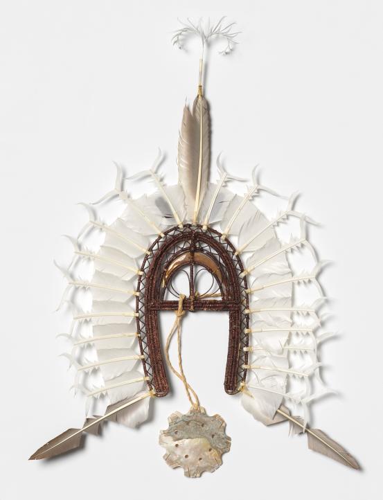 Samuel Tainga Toa Savage<br/>
<em>Dhari (Headdress)</em> 2014 <!-- (verso) --><br />

saltwater Hibiscus string, Lawyer cane, Torres Strait pigeon feathers, golden lip pearly (Dibi Dibi), Wada seed, mother-of-pearl<br />
78.0 x 55.2 x 9.0 cm<br />
National Gallery of Victoria, Melbourne<br />
Purchased with funds donated by the Nordia Foundation, 2016<br />
2015.547<br />
© Courtesy of the artist
<!--118125--><br/><a class="col-link block" href="/explore/collection/work/118125"><strong>Collection page <i class="fa fa-angle-right"></i></strong></a>
