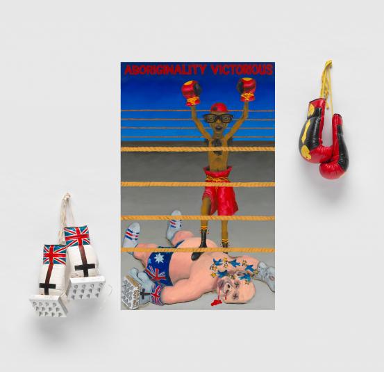 Gordon Hookey<br/>
<em>Aboriginality victorious</em> 2008 <!-- (recto) --><br />

oil paint, plastic and metal on canvas, paper, metal and metallic and oil paint on boxing gloves<br />
(a-c) 128.0 x 159.6 cm (variable) (overall)<br />
National Gallery of Victoria, Melbourne<br />
Purchased, NGV Supporters of Indigenous Art, 2008<br />
2008.509.a-c<br />
© Gordon Hookey/Licensed by Copyright Agency, Australia
<!--87835--><br/><a class="col-link block" href="/explore/collection/work/87835"><strong>Collection page <i class="fa fa-angle-right"></i></strong></a>