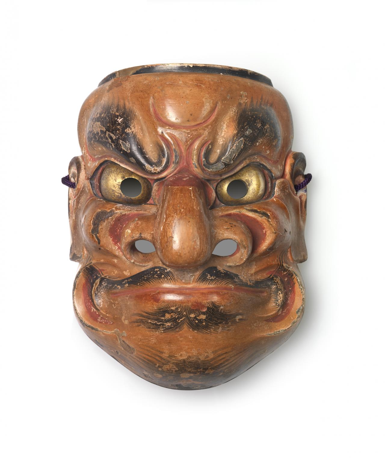 DEME Hidemitsu (attributed to)<br/>
<em>Noh mask, Ōbeshimi</em> (17th century) <!-- (recto) --><br />
<em>(Nōmen Ōbeshimi 能面 大癋見)</em><br />
pigments, ground shell and animal glue on Cypress (Hinoki), silk (thread, cord)<br />
22.0 x 15.5 x 11.0 cm<br />
National Gallery of Victoria, Melbourne<br />
Purchased with funds donated by Allan Myers AO and Maria Myers AO, 2011<br />
2011.352<br />

<!--100568-->