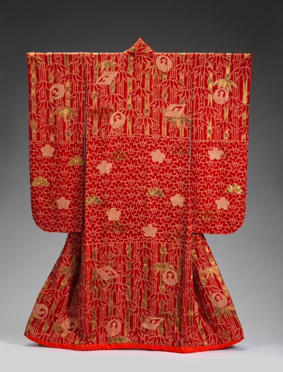 JAPANESE<br/>
<em>Uchikake Furisode wedding kimono with pine, bamboo, plum, and cranes</em> (early 19th century-mid 19th century) <!-- (view 1) --><br />

satin silk, shibori tie dyeing, embroidery, gold thread<br />
177.5 cm (centre back) 131.0 cm (cuff to cuff)<br />
National Gallery of Victoria, Melbourne<br />
Purchased with funds donated by Michael and Emily Tong, 2024<br />
2024.90<br />

<!--154705--><br/><a class="col-link block" href="/explore/collection/work/154705"><strong>Collection page <i class="fa fa-angle-right"></i></strong></a>