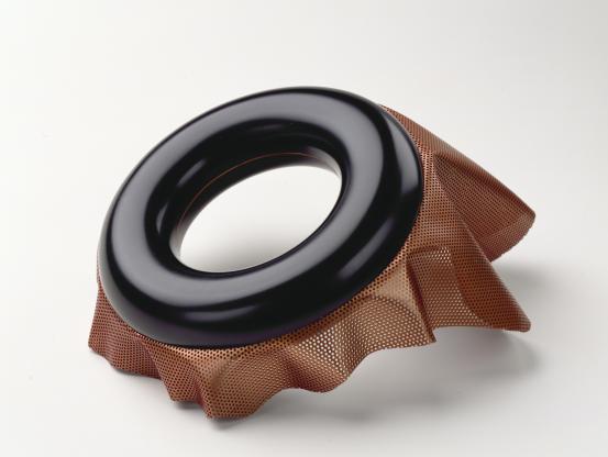 Susan COHN<br/>
<em>Flyaway, bracelet</em> (1987) <!-- (full view) --><br />

anodised aluminium<br />
18.0 x 16.0 x 9.0 cm<br />
National Gallery of Victoria, Melbourne<br />
Purchased from Admission Funds, 1991<br />
D94-1991<br />
© Susan Cohn
<!--21350--><br/><a class="col-link block" href="/explore/collection/work/21350"><strong>Collection page <i class="fa fa-angle-right"></i></strong></a>