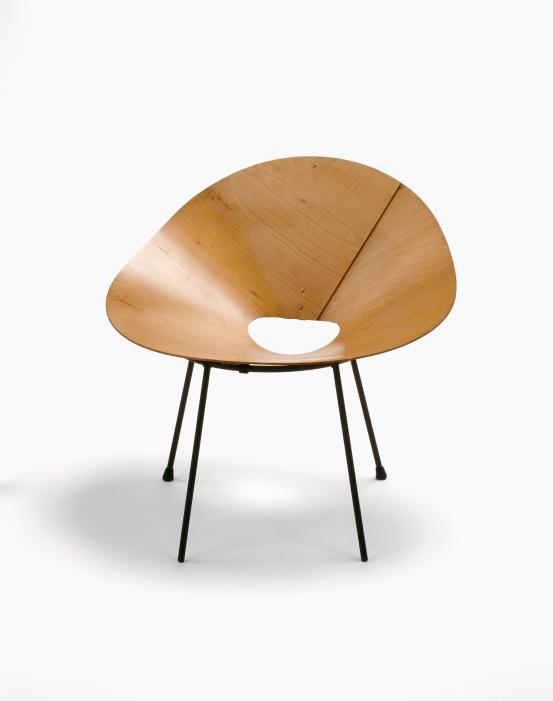 Roger McLAY<br/>
<em>Kone chair</em> (1948) <!-- (full view) --><br />

plywood, steel, rubber, brass<br />
72.0 x 78.3 x 63.0 cm<br />
National Gallery of Victoria, Melbourne<br />
Purchased, 1998<br />
1998.2<br />

<!--61369-->