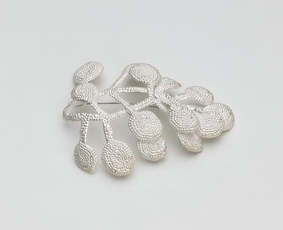 Julie BLYFIELD<br/>
<em>Acacia, brooch</em> (2004) <!-- (view 1) --><br />

sterling silver<br />
9.3 x 6.6 x 1.9 cm<br />
National Gallery of Victoria, Melbourne<br />
Purchased with funds from the Victorian Foundation for Living Australian Artists, 2005<br />
2005.173<br />
&copy; Julie Blyfield/Licensed by Copyright Agency, Australia
<!--77581-->