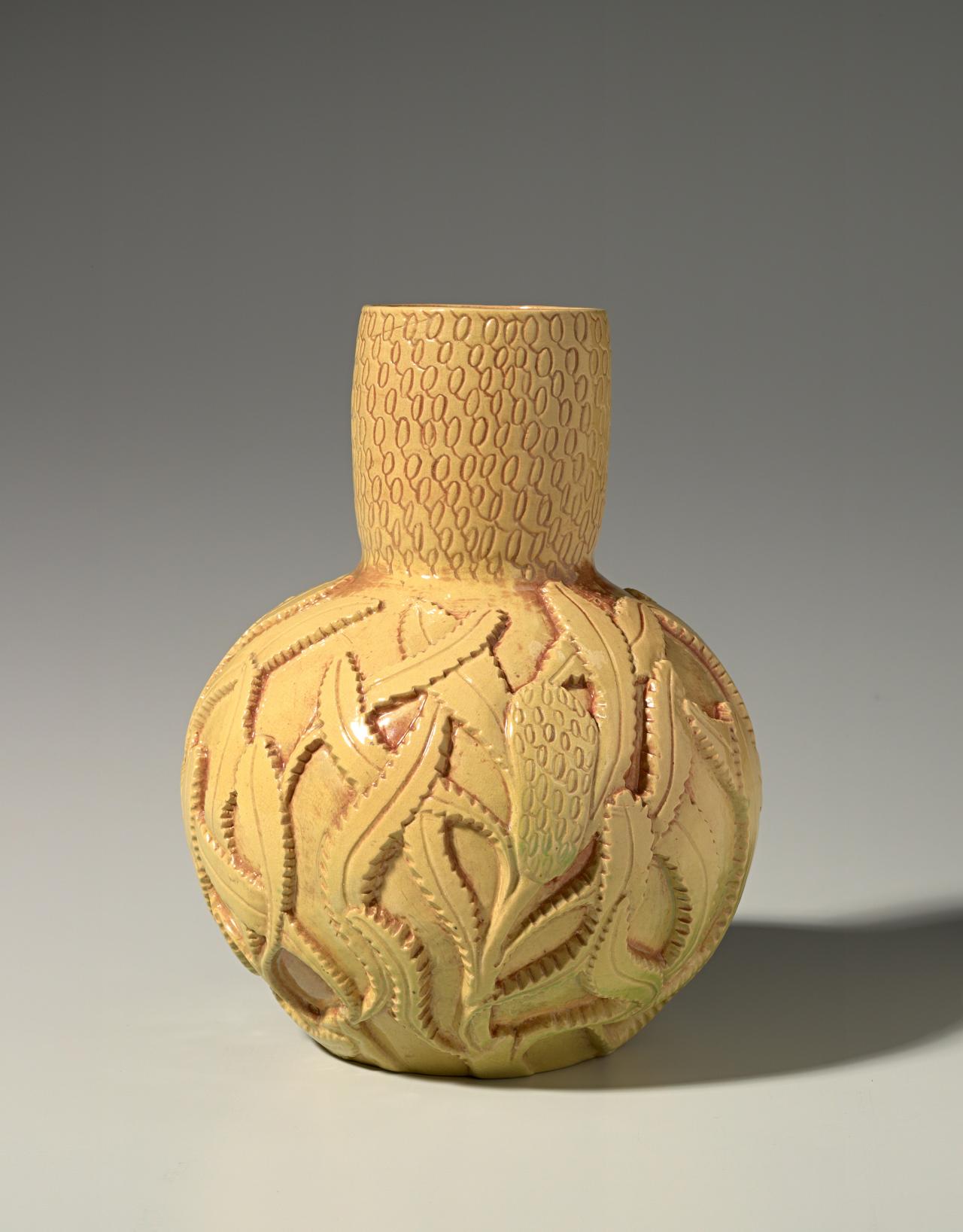 Klytie PATE<br/>
<em>Bottle-brush, vase</em> (c. 1939) <!-- (view 1) --><br />

earthenware<br />
24.6 x 19.4 cm diameter<br />
National Gallery of Victoria, Melbourne<br />
Purchased with the assistance of the Crafts Board of the Australia Council, 1980<br />
D357-1980<br />
© Courtesy of the artist
<!--19249-->