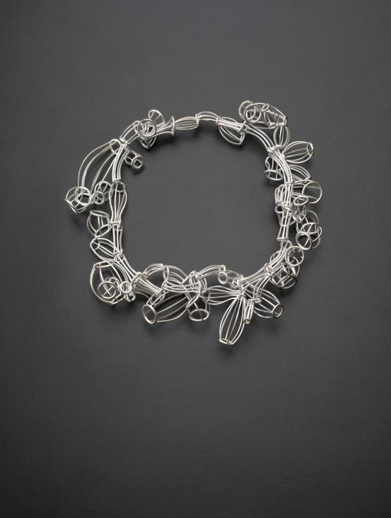 Carlier MAKIGAWA<br/>
<em>Neckpiece</em> (2007) <!-- (recto) --><br />

sterling silver<br />
20.3 x 20.4 x 4.2 cm (variable)<br />
National Gallery of Victoria, Melbourne<br />
Purchased, Victorian Foundation for Living Australian Artists, 2007<br />
2007.717<br />
© Carlier Makigawa
<!--85447--><br/><a class="col-link block" href="/explore/collection/work/85447"><strong>Collection page <i class="fa fa-angle-right"></i></strong></a>