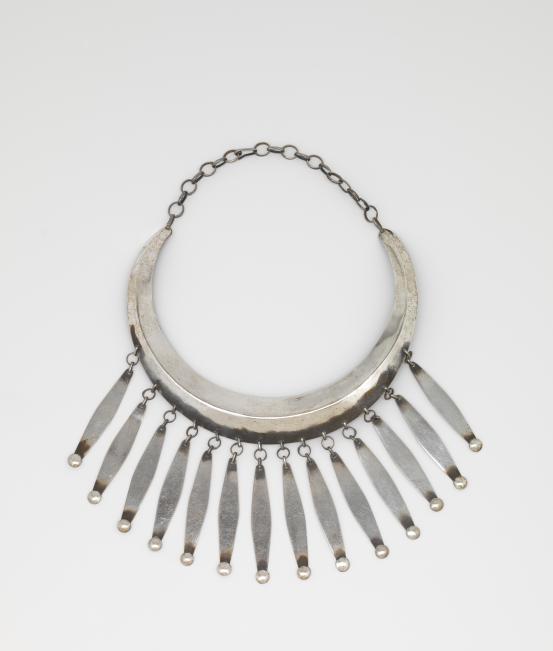 Inge KING<br/>
<em>Necklace</em> (c. 1960) <!-- (full view) --><br />

sterling silver<br />
22.5 x 15.0 x 1.2 cm (variable)<br />
National Gallery of Victoria, Melbourne<br />
Purchased NGV Foundation, 2013<br />
2013.695<br />
© The estate of Inge King
<!--108433--><br/><a class="col-link block" href="/explore/collection/work/108433"><strong>Collection page <i class="fa fa-angle-right"></i></strong></a>