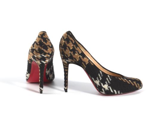 MARTIN GRANT, Paris (fashion house)<br />
 Martin GRANT (designer)<br />
 Christian LOUBOUTIN (shoemaker)<br/>
<em>Stilettos</em> 2012 {autumn-winter 2012&ndash;13} <!-- (view 1) --><br />

wool (tweed, houndstooth), leather, rubber<br />
(a-b) 17.5 x 8.0 x 21.5 cm (each)<br />
National Gallery of Victoria, Melbourne<br />
Gift of the artist, 2023<br />
2023.472.a-b<br />

<!--147831-->