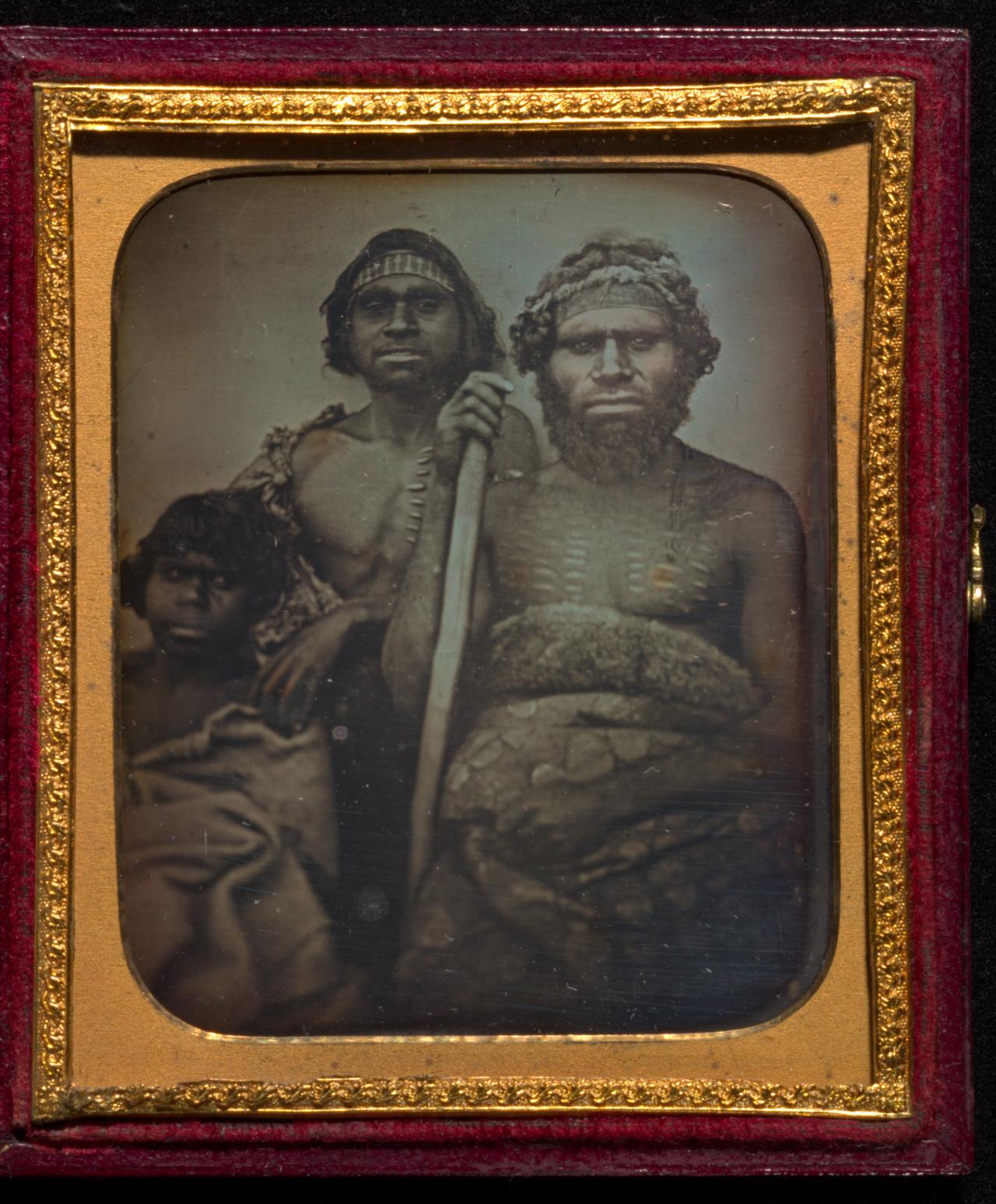 Douglas T. KILBURN<br/>
<em>No title (Group of Koori men)</em> (c. 1847) <!-- (recto) --><br />

daguerreotype, leather, wood, velvet, brass<br />
(7.5 x 6.5 cm) (image) 9.2 x 7.9 x 1.7 cm (case) (closed)<br />
National Gallery of Victoria, Melbourne<br />
Purchased from Admission Funds, 1983<br />
PH407-1983<br />

<!--10001-->