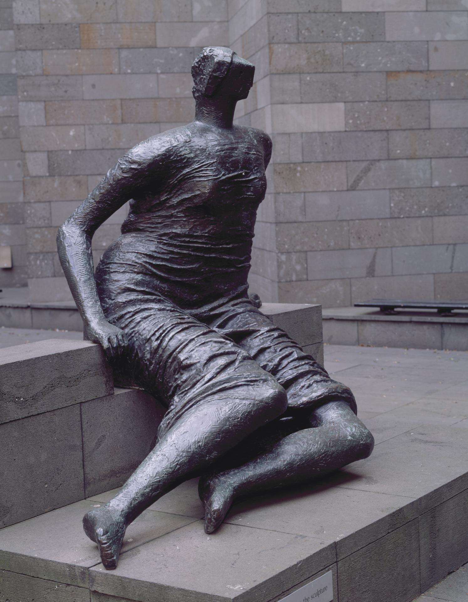 Between Beauty and Power: Henry Moore's Draped seated woman as an