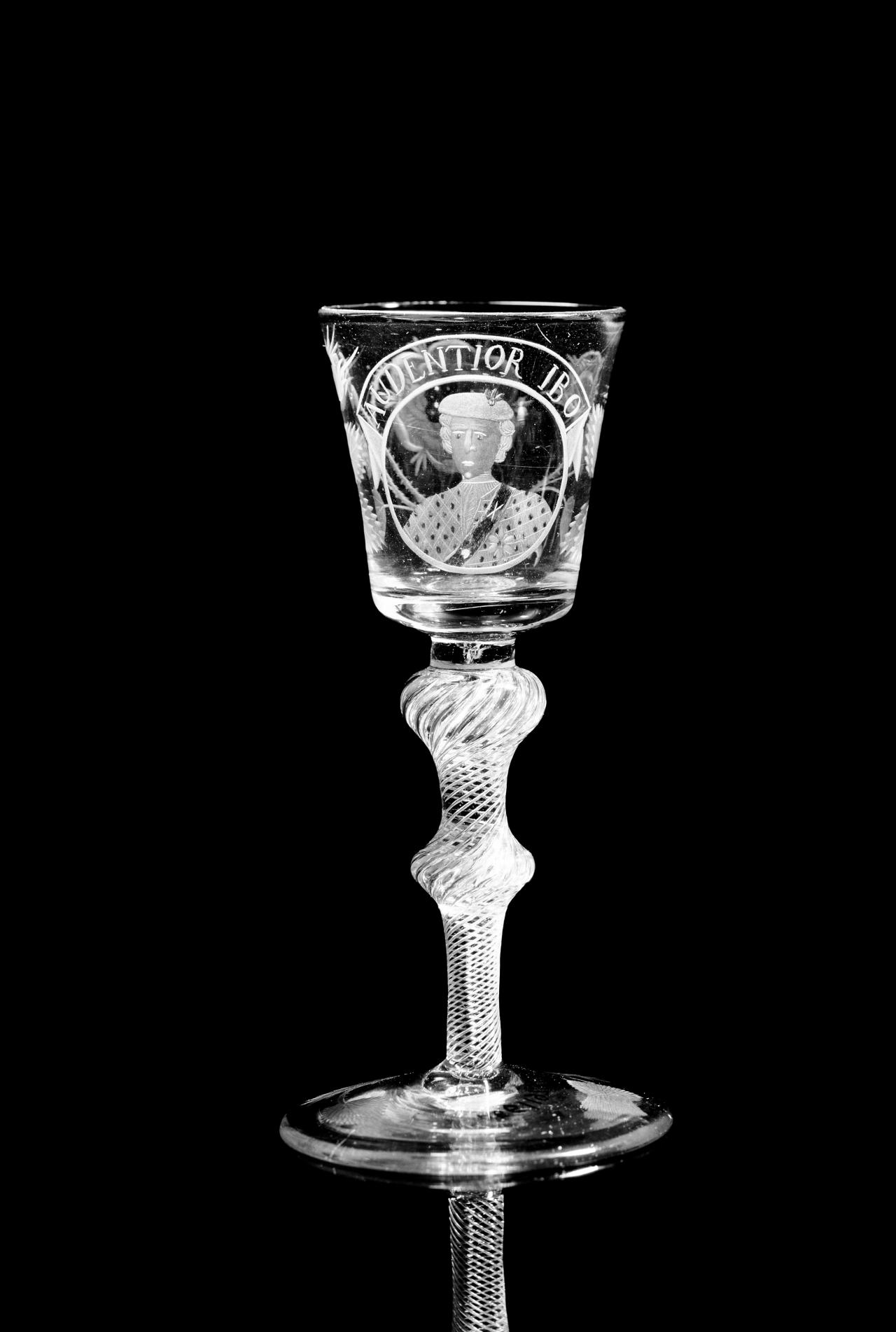 England<br/>
<em>Wine glass</em> c.1750<br/>
glass (wheel-engraved, air-twist stem)<br/>
14.7 x 7.0 cm diameter<br/>
National Gallery of Victoria, Melbourne<br/>
William and Margaret Morgan Endowment, 1973 (D86-1973)<br/>