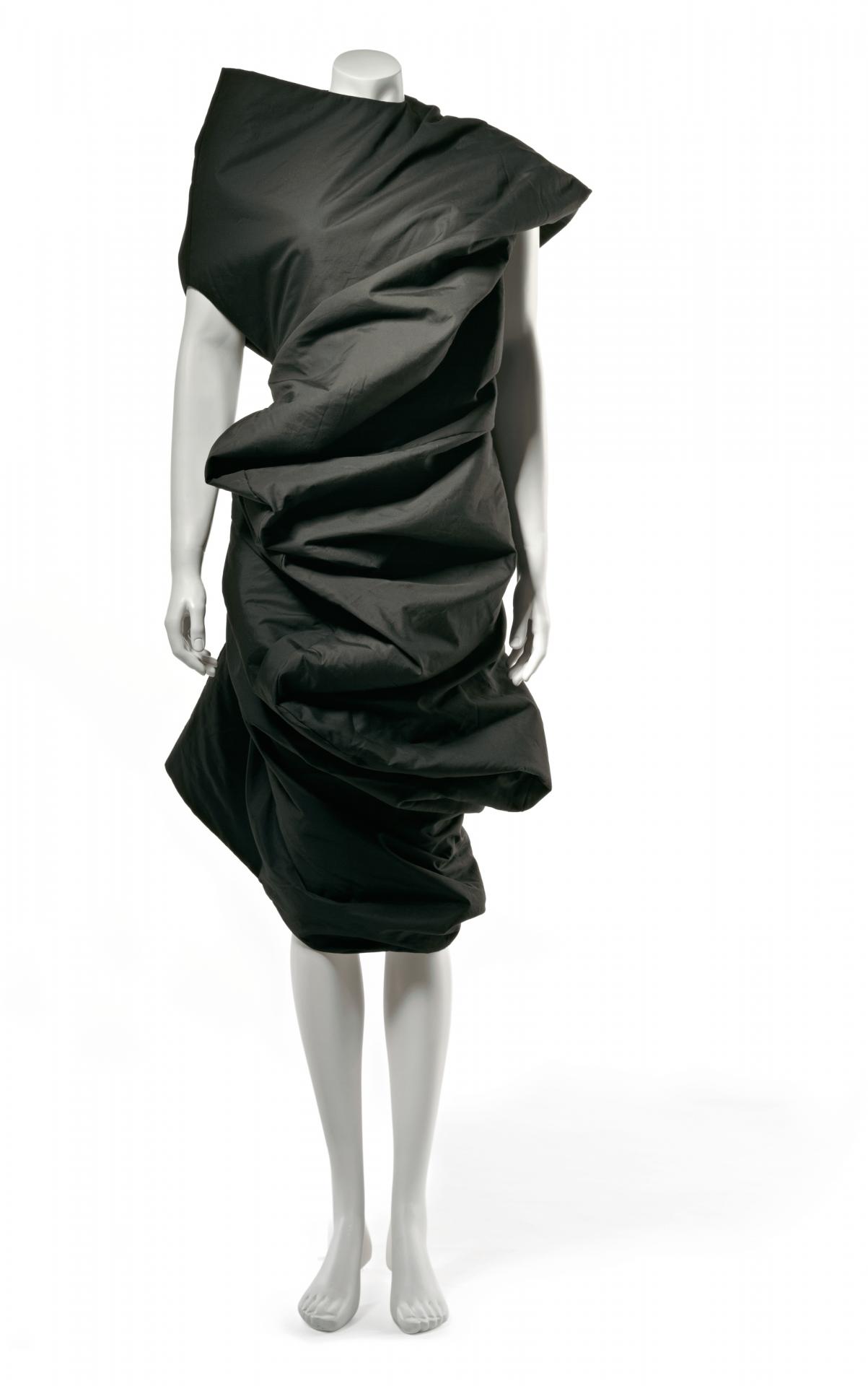 Comme Des Garçons, Tokyo fashion house<br/>
est. 1969<br/>
Rei Kawakubo designer<br/>
born Japan 1942–<br/>
<em>Dress</em> 1997 spring–summer<br/>
cotton, polyester, nylon tulle<br/>
110.0 cm (centre back); 53.0 cm (width, flat)<br/>
Presented through the NGV Foundation by<br/>
Takamasa Takahashi, Fellow, 2005 (2005.375)<br/>