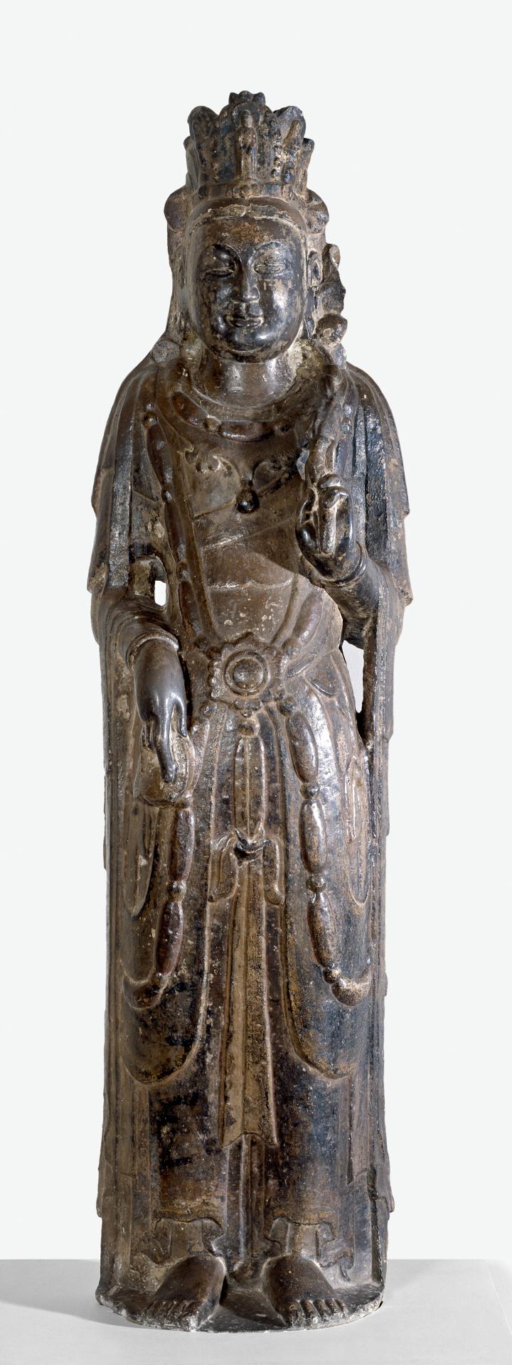 fig. 1 <br/>
China <br/>
Northern Qi dynasty<br/>
<em>The Bodhisattva Avalokiteshvara</em> c.570–77<br/>
limestone with traces of pigment, lacquered with traces of gilding<br/>
height 155.0 cm<br/>
National Gallery of Victoria, Melbourne<br/>
Felton Bequest, 1956 (1669-D4)<br/>