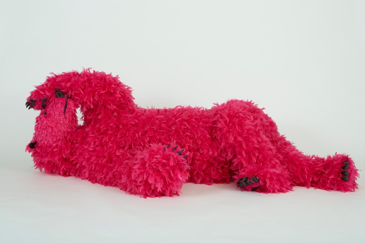 Paola Pivi<br/>
<em>Don’t change my name please</em> 2013 <br/>
from <em>OK, you are better than me, so what?</em><br/>
urethane foam, plastic, feathers<br/>
72.0 x 221.0 x 107.0 cm <br/>
Photo: Guillaume Ziccarelli<br/>
© Paola Pivi, courtesy Galerie Perrotin