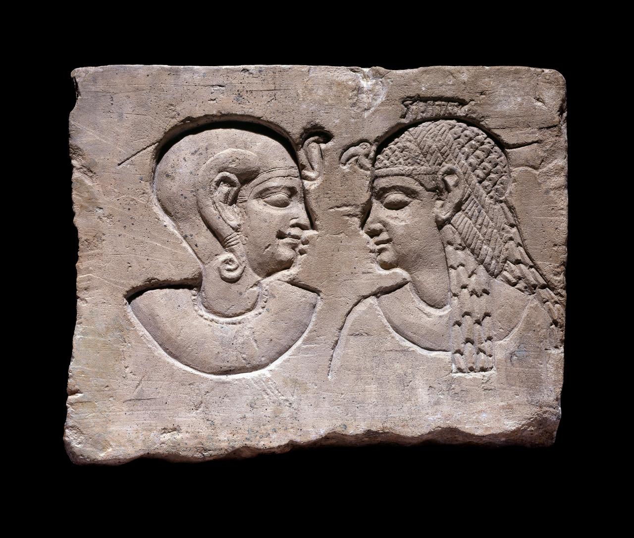 Relief of a mother, possibly a queen, and her son​ <br/>
findspot unknown, probably Egypt  <br/>
Ptolemaic Period, about 305–30 BCE  <br/>
limestone <br/>
H 15.5 cm, W 19.2 cm, D 4 cm​ <br/>
British Museum, London <br/>
EA57348<br/>
© The Trustees of the British Museum