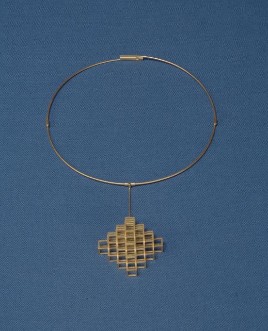 Frank BAUER<br/>
<em>Neckpiece</em> (1982) <!-- (full view) --><br />

18ct gold<br />
20.0 x 12.6 x 2.5 cm<br />
National Gallery of Victoria, Melbourne<br />
Purchased, 1992<br />
D34-1992<br />
© Courtesy of the artist
<!--21309--><br/><a class="col-link block" href="/explore/collection/work/21309"><strong>Collection page <i class="fa fa-angle-right"></i></strong></a>